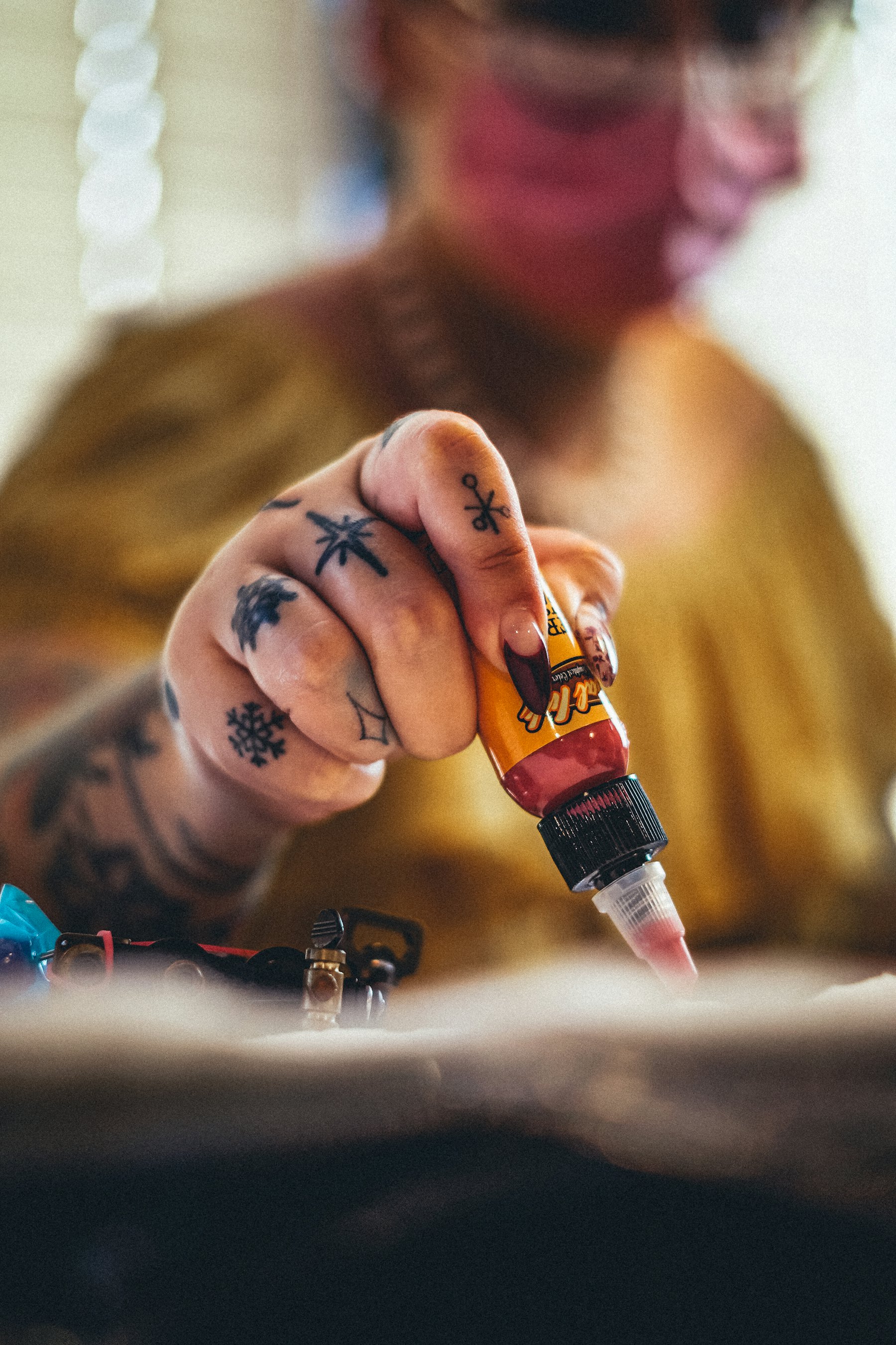 Studio workbench with bottles of black ink